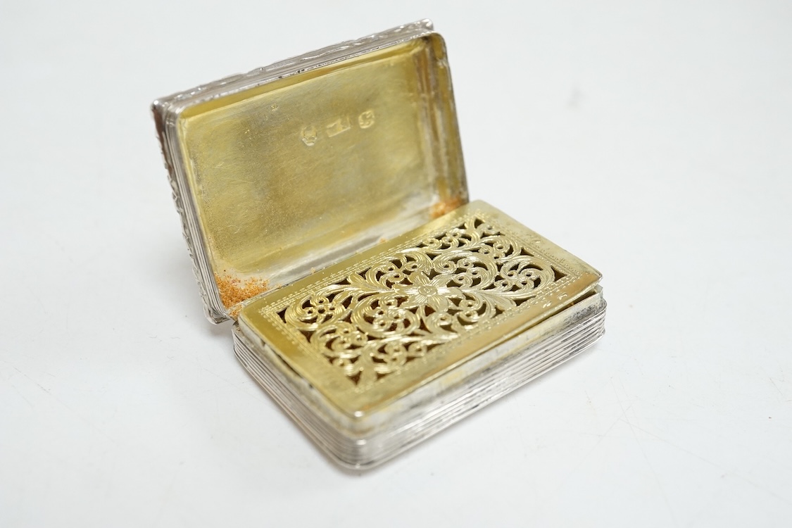 A William IV engine turned silver rectangular vinaigrette, by William Simpson, Birmingham, 1830, the central cartouche engraved 'Remember Me', 42mm (grille detached).